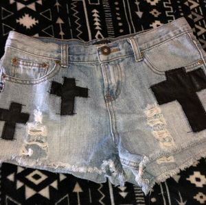 Blue jean shorts with crosses